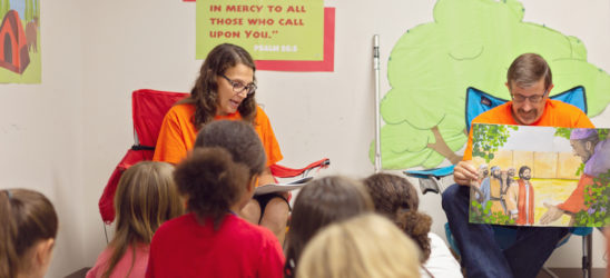 Teachers teaching a bible lesson